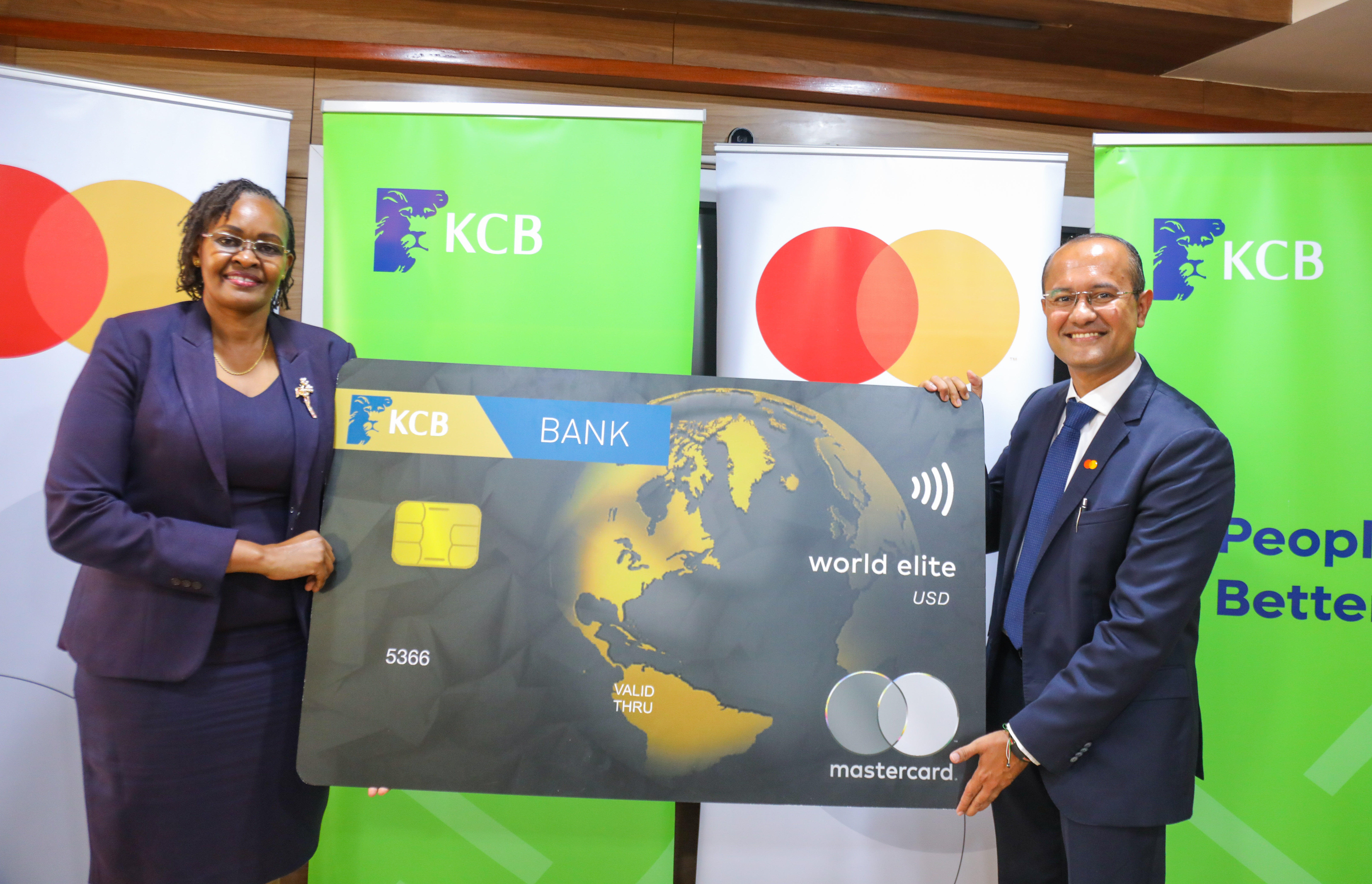Shehryar Ali, Senior Vice President and Country manager for East Africa and Indian Ocean Islands at Mastercard (Right) and Annastacia Kimtai, KCB Bank Kenya Managing Director(Left) during the official unveiling of the KCB World Elite Card at Kencom Towers, Nairobi.