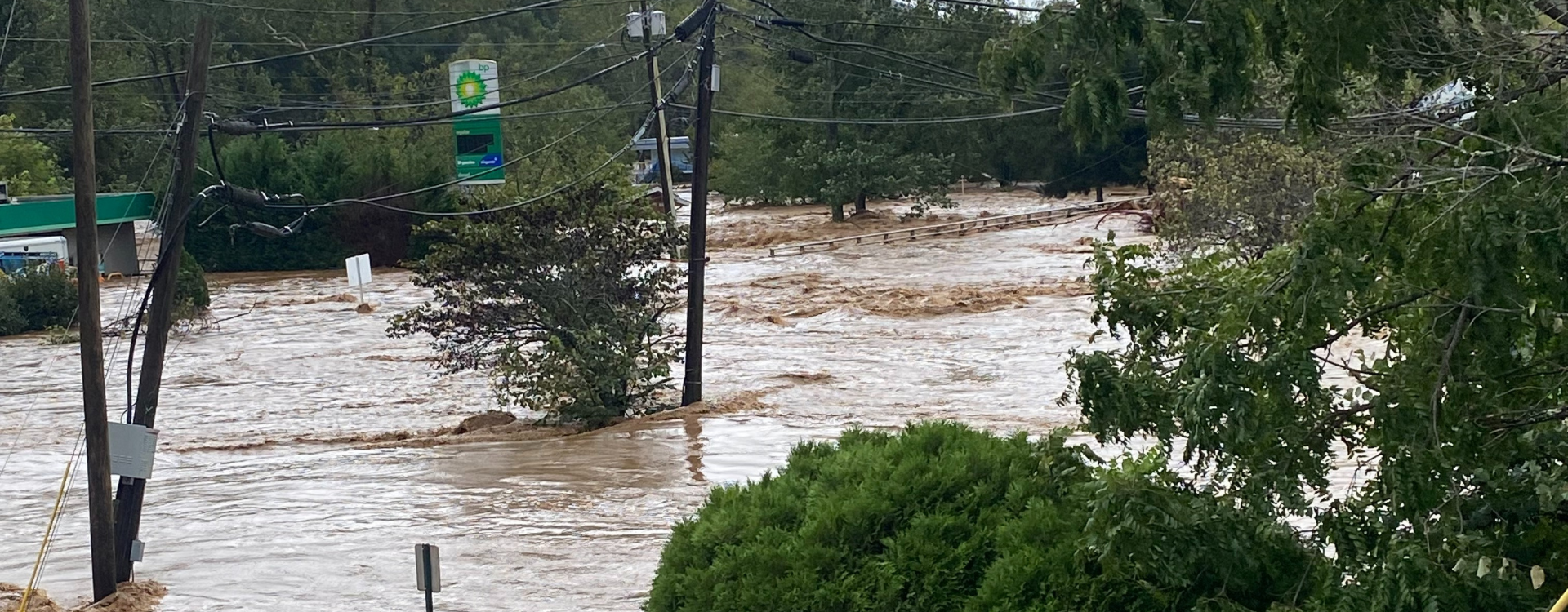 Floodwaters engulf a street in the aftermath of Hurricane Helene in Asheville, N.C.